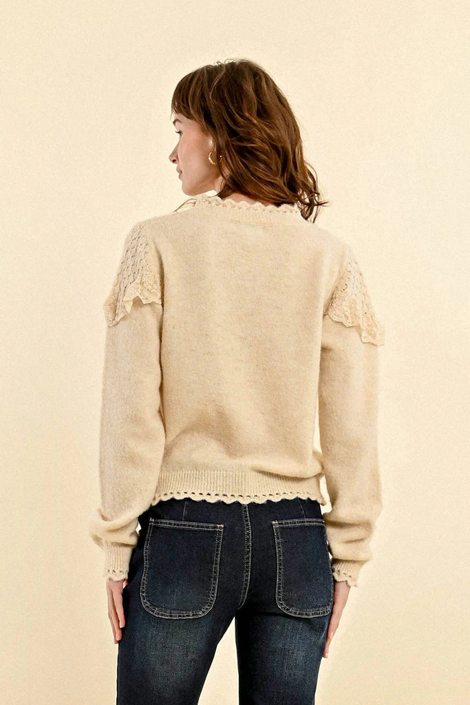 RUFFLED POINTELLE KNIT SWEATER